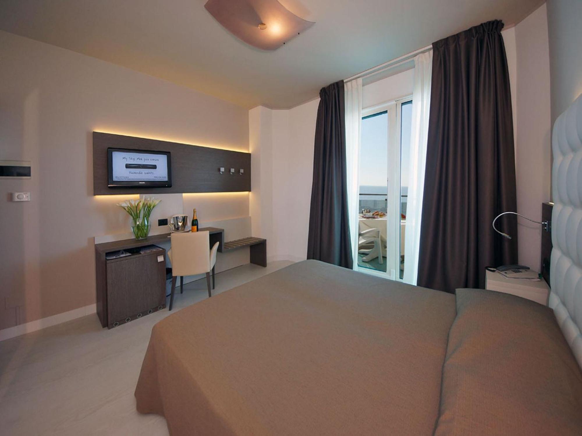 Chambre Quadruple avec Balcon et Vue sur la Mer